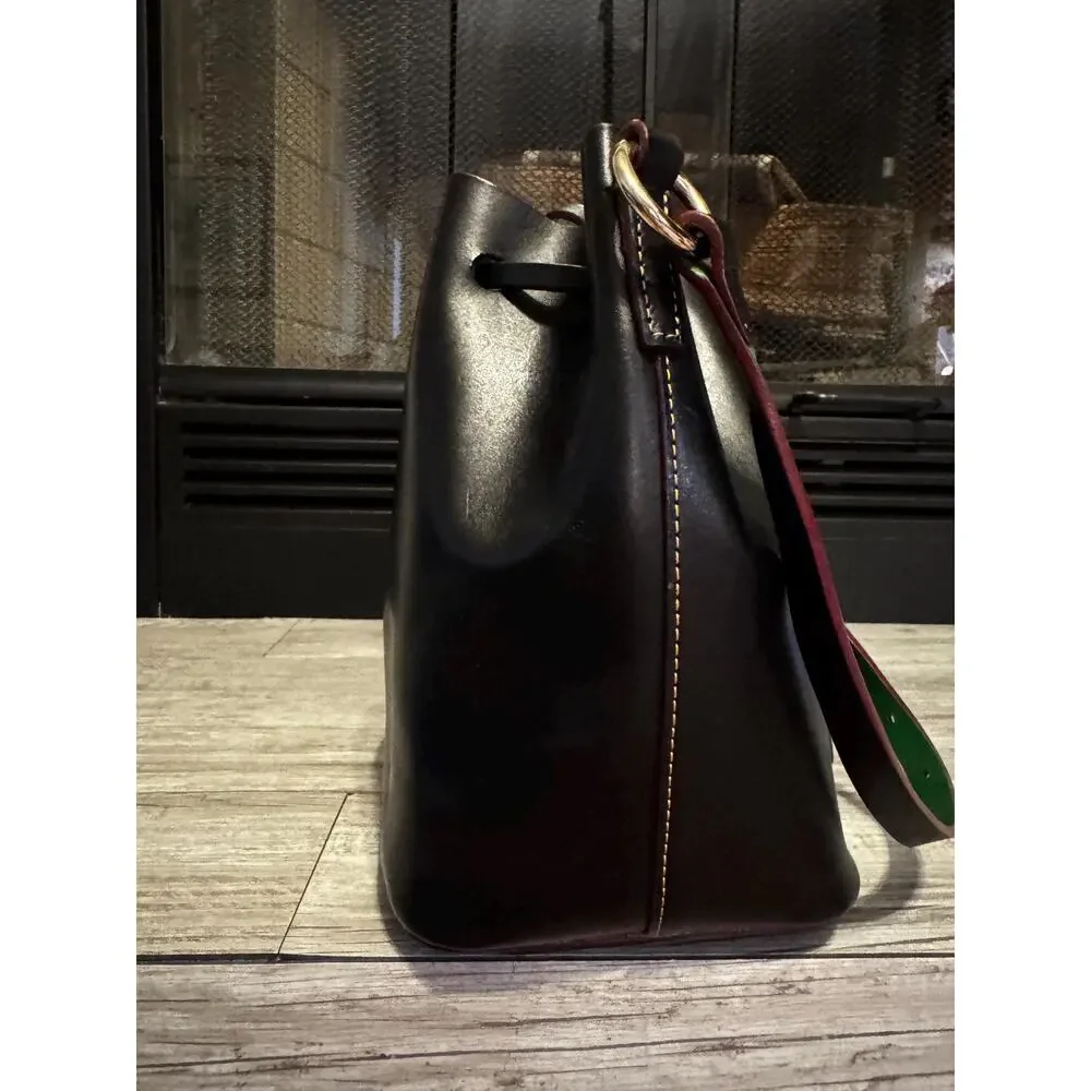 Dooney and Bourke smooth drawstring black green leather Serena Bucket bag purse